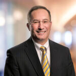 Headshot of Chris Didio, managing partner at Dannible & McKee